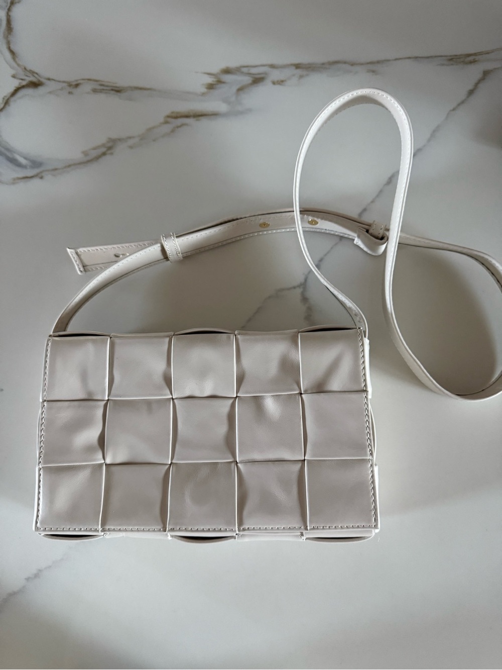 Woven Leather Cassette Bag in cream
